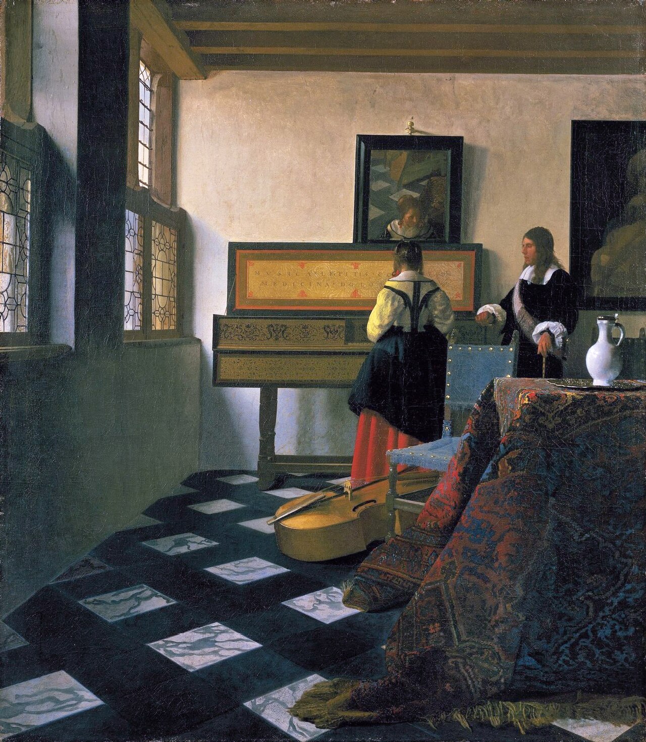 Vermeer’s The Music Lesson, showing a woman at a virginal and a man in a light-filled room